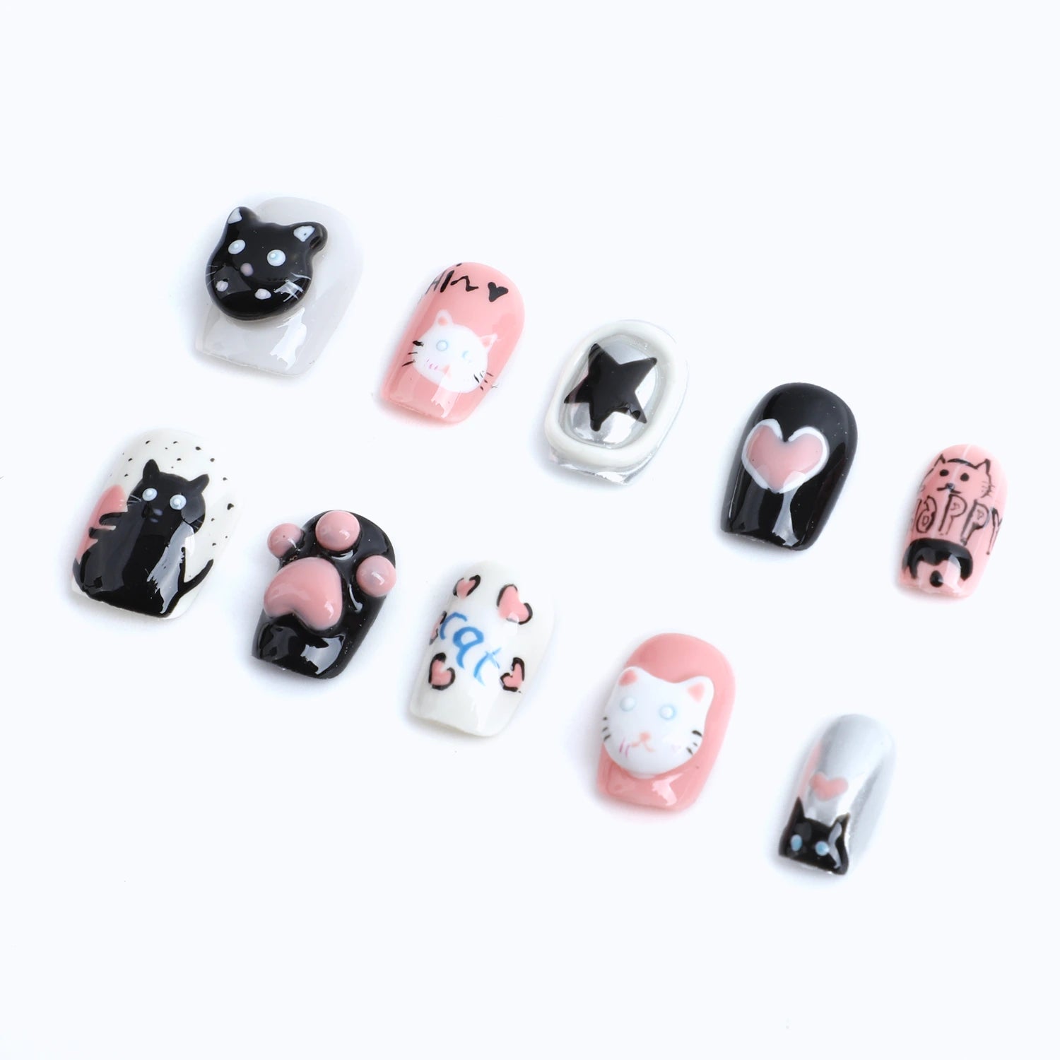 Embrace your love for all things cute with these adorable 3D cats and heart-themed press-on nails