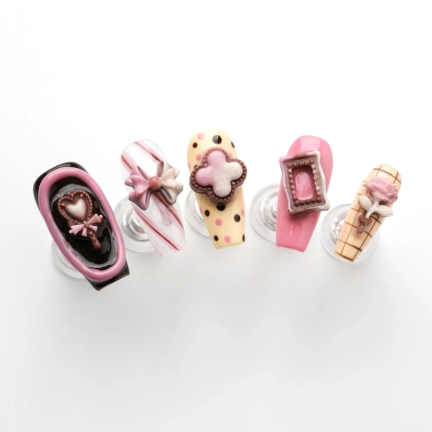 Cute pink candy-colored nails, each nail has a cute and peculiar pattern