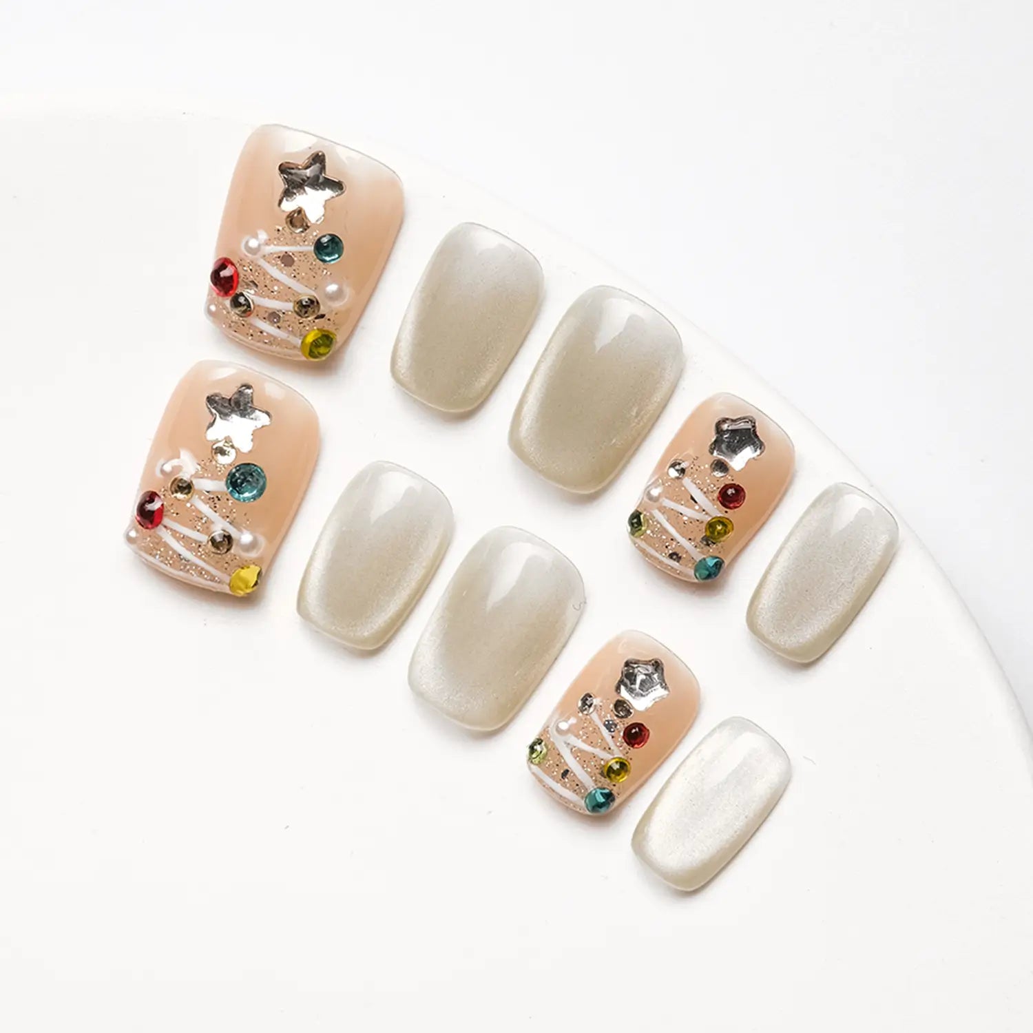 The base color of the nail art is silver and gold.