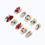 Press-on nails from the left side, showing the precise nail shape and the exquisite 3D nail design.