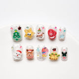 Close-up shot from the front showing detailed nail art, intricate 3D Christmas tree decorations and bright colors