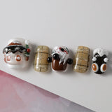 5 press-on nails that highlight the animated elements of 3D nail art design