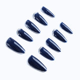 Press-on nails from a side view, showing the clear nail shape and 3D delicate design.