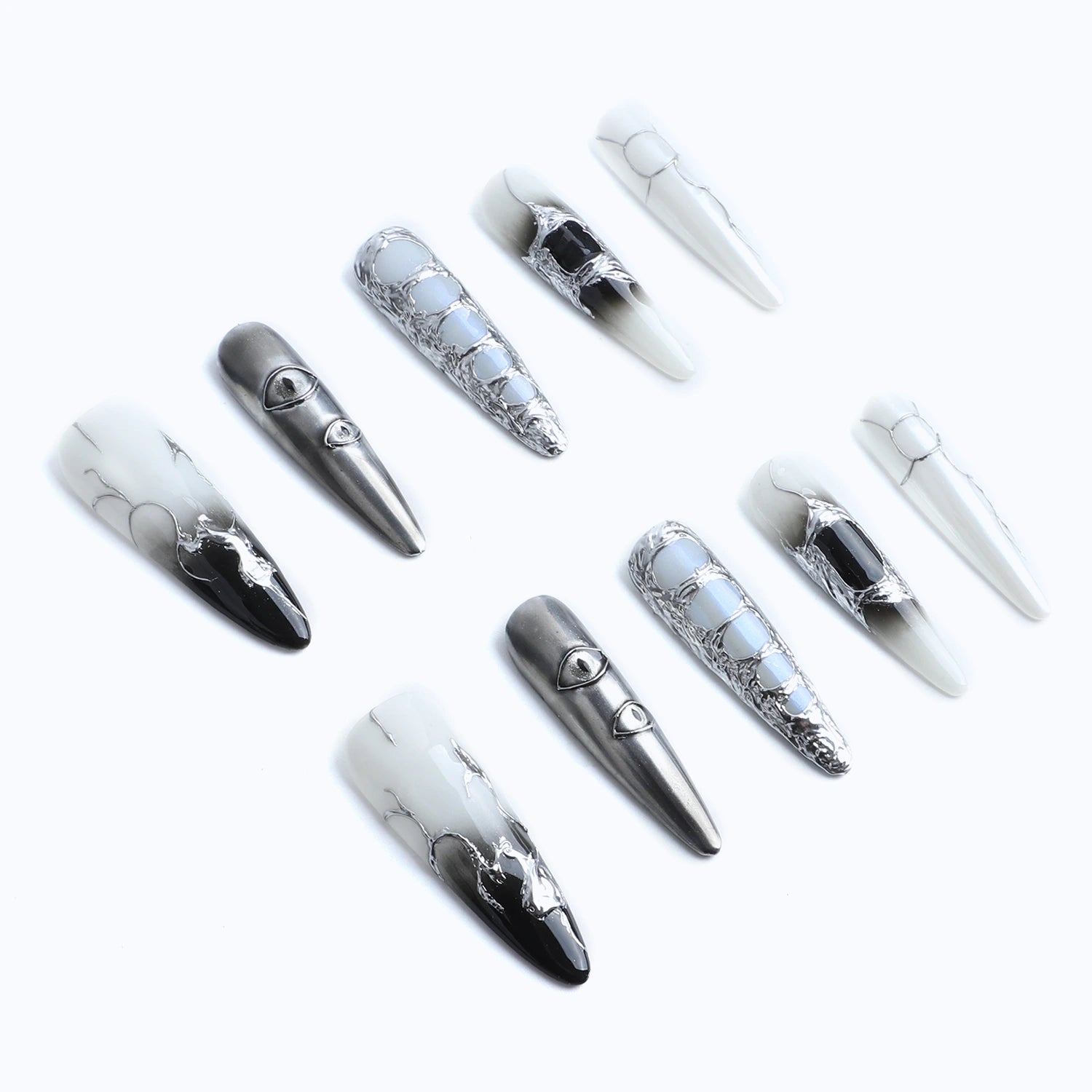 This set of artistic nails combines modern and edgy designs, perfect for making a bold statement.