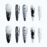 10PCS Futuristic eye design nail set with cracked metallic and marble patterns for stiletto nails display
