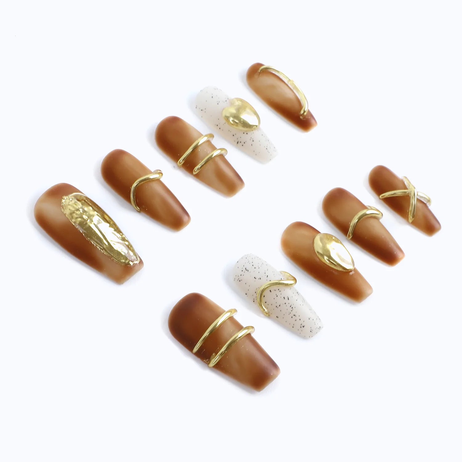 The fall nail design base color is matte brown, matched with shiny white, and dotted with gold decorations.