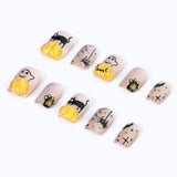 Nails with cute elements such as pumpkins, kittens, fairies and spiders