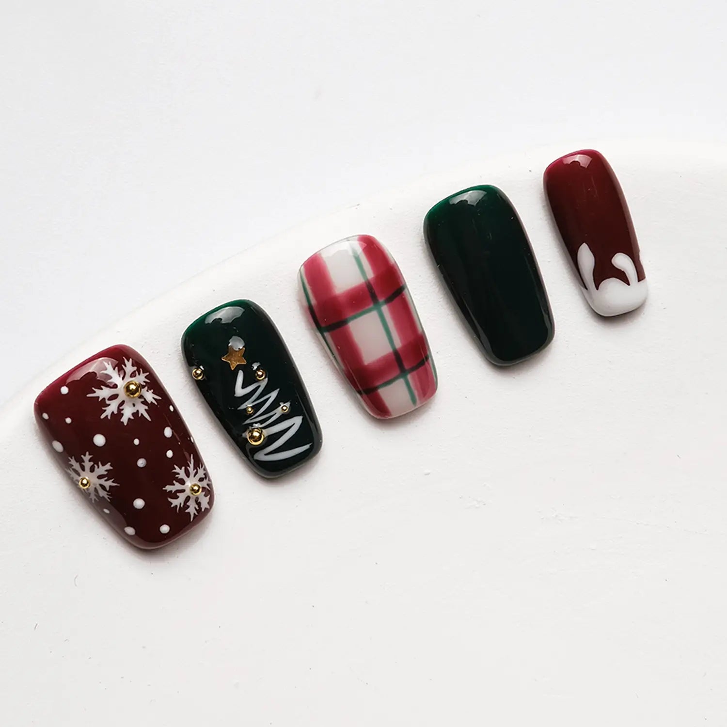 Press-on nails from the left side, showing the clear nail shape and the exquisite 3D nail design.