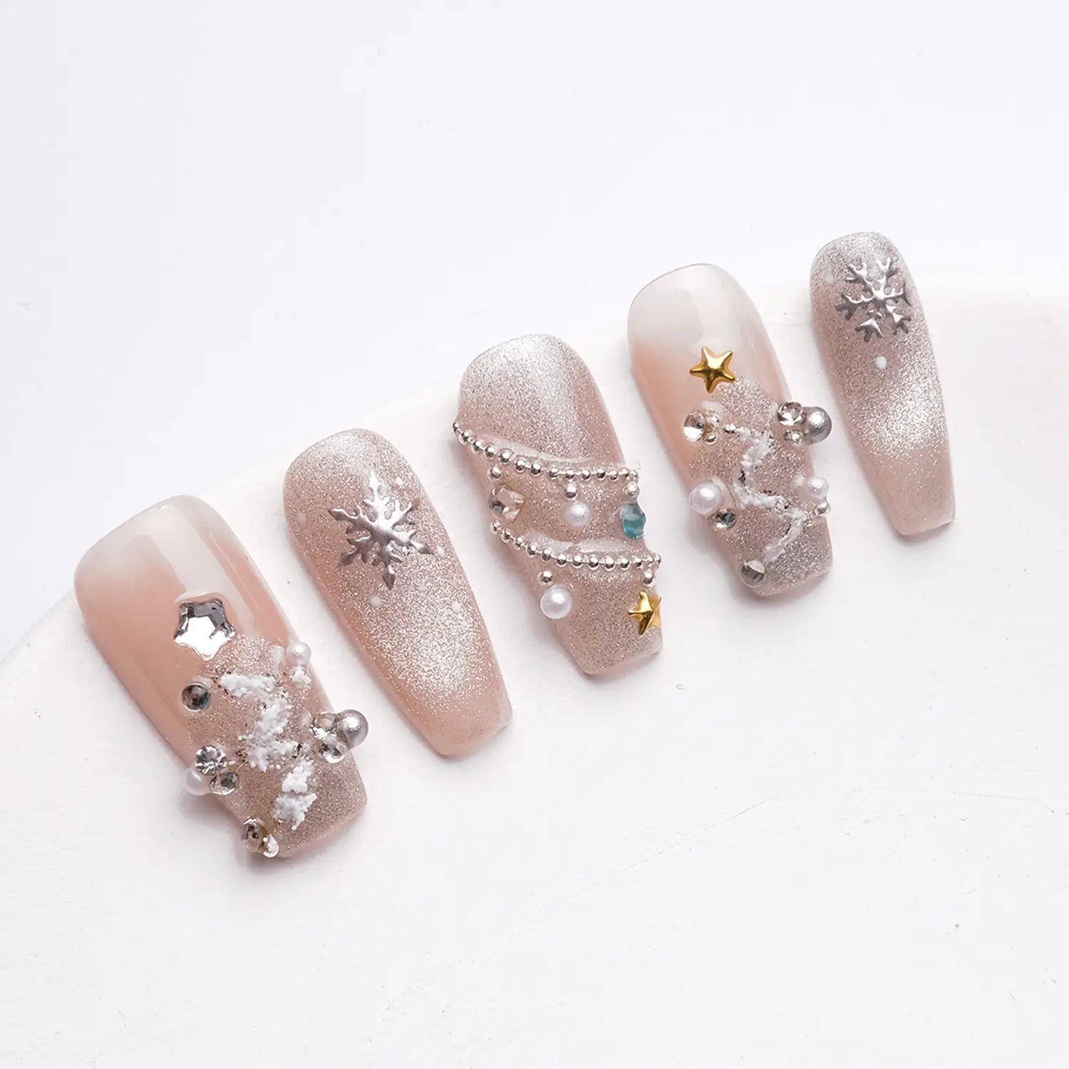 This coffin nail art design perfectly combines winter elements with an elegant, festive, feminine style.