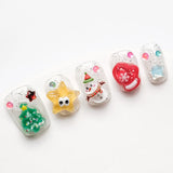 Close-up showing detailed, shiny nails with detailed animal 3D decorations and bright colors