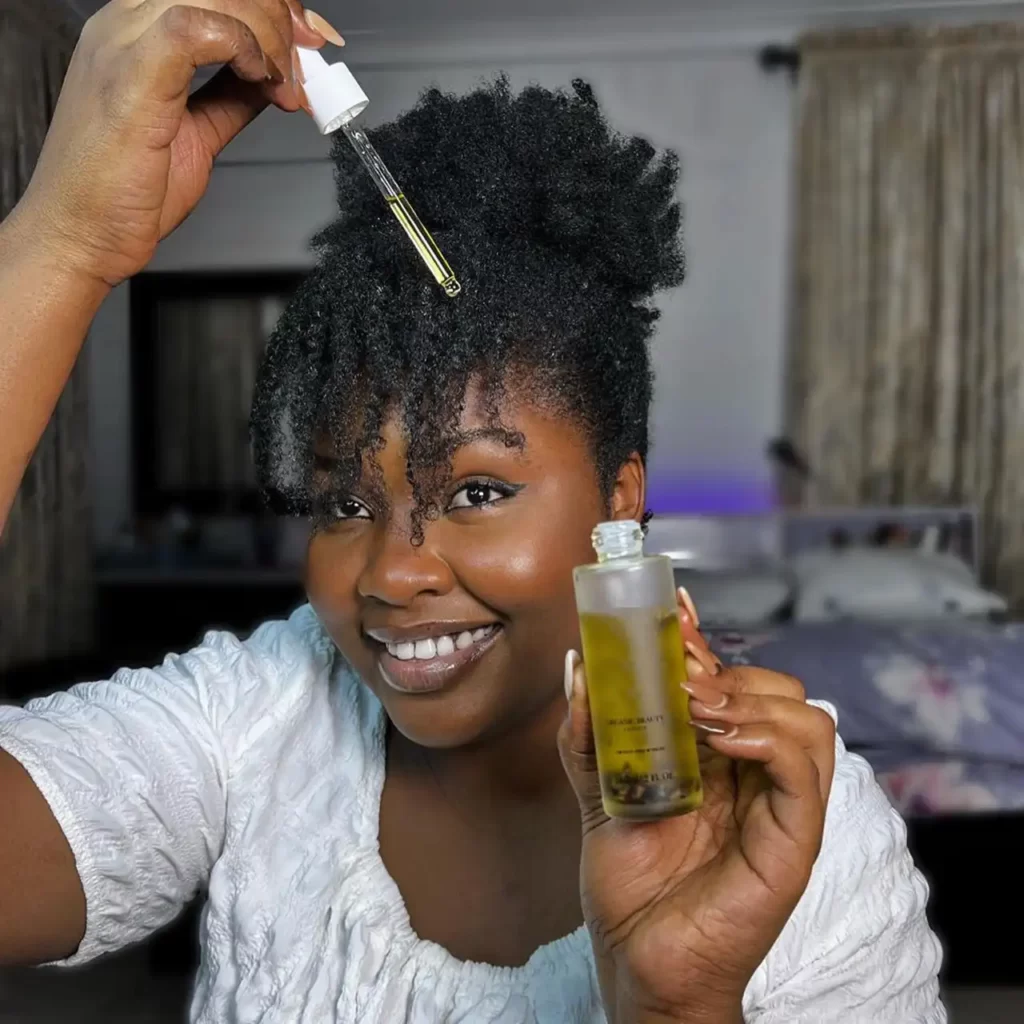 Radiant smile with 4C hair care routine.